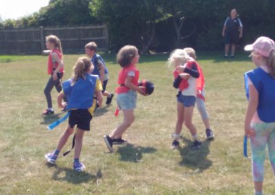 Dragonball outside with players passing the ball within their team