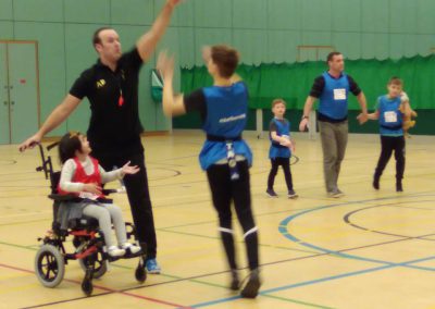 Reaching for the Dragonball as part of an indoor SEND Dragonball session
